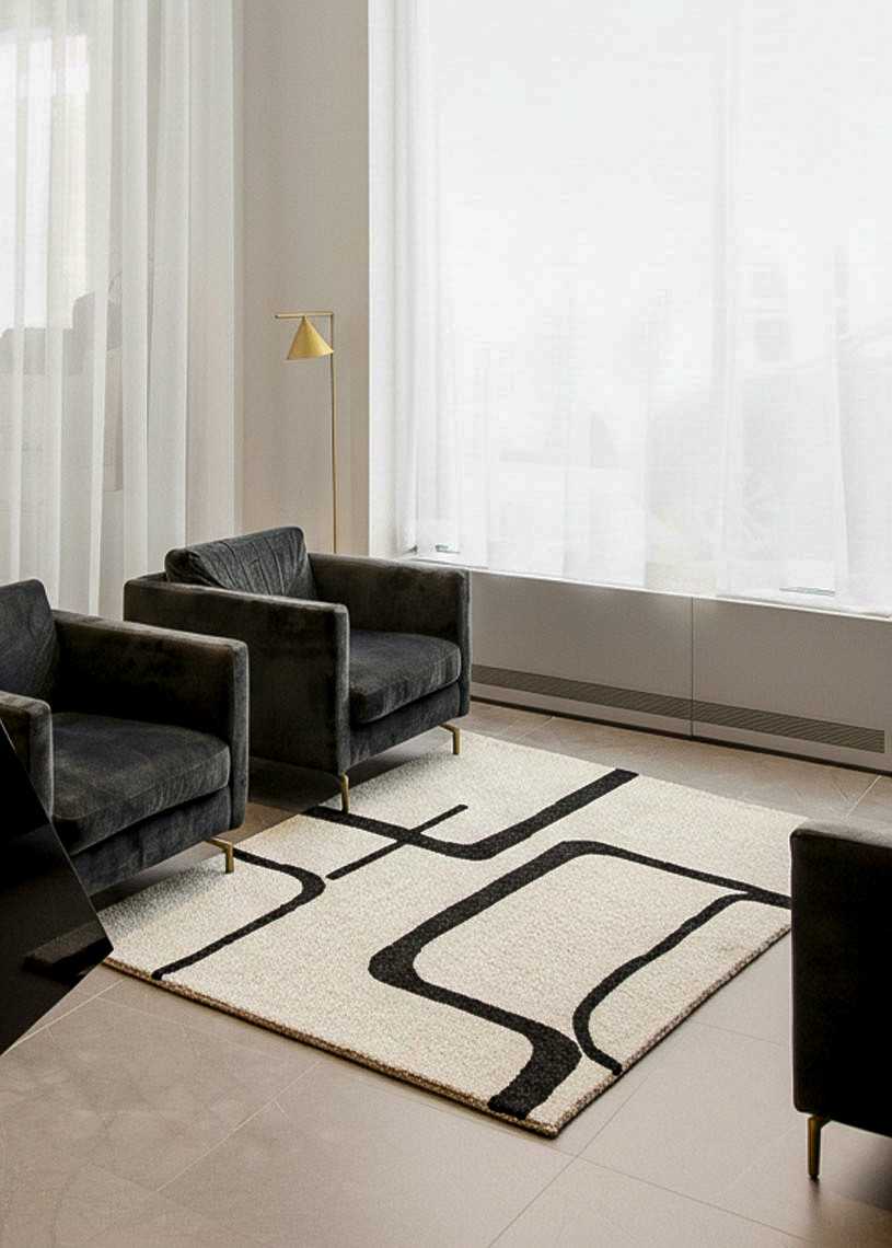 Tapis en laine moderne crème noir fait main ARAGONE