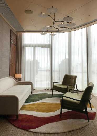 Tapis rond en laine fait...