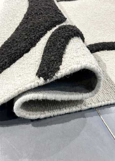 Tapis en laine moderne crème noir fait main ARAGONE